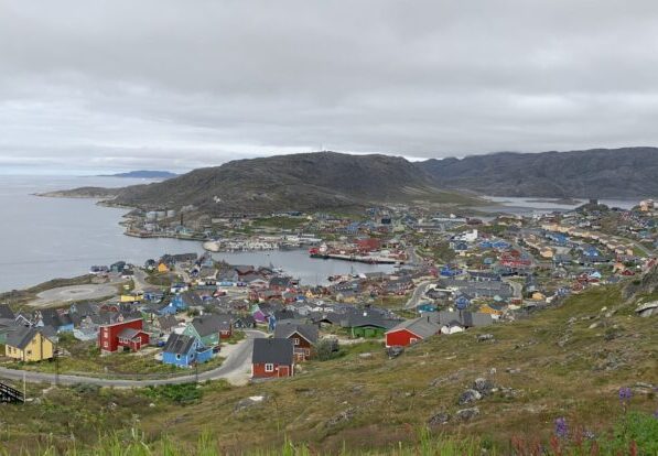 Image showing a Greenlandic community from atop a hill