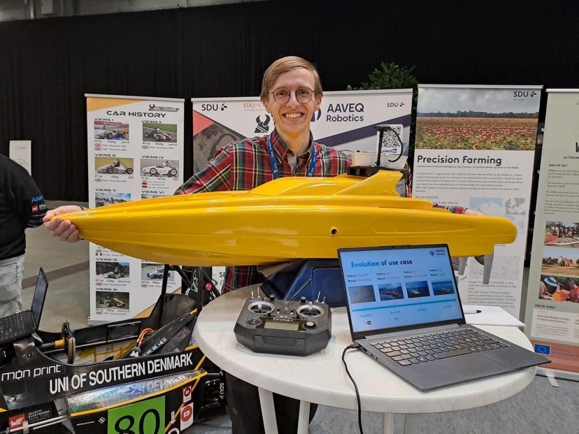 Magne showing off AAVEQ's smaller boat